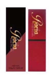 a bottle of perfume with a red and gold label