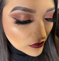 a close up of a woman's eye makeup